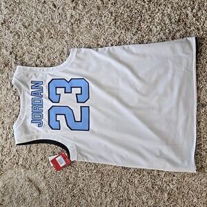 UNIVERSITY OF NORTH CAROLINA REVERSIBLE BASKETBALL JERSEY